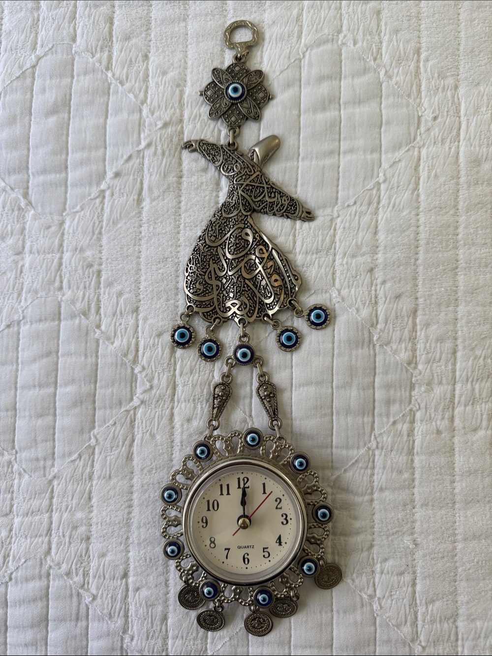 Silver Whirling Dervish Wall Clock with Blue Eye Accents from Turkey
